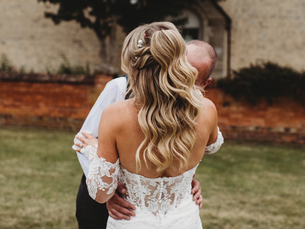 Elegant bride with beautiful curled hairstyle